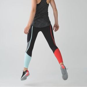 Lululemon Pedal To The Medal 7/8 Tight
Black / Alarming / Tranquil Blue (6)